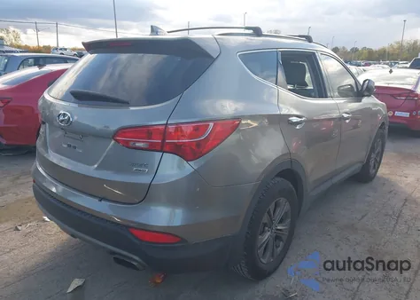 2015 Hyundai Santa Fe Sport 2.4L z USA, uszkodzony, nr VIN 5XYZUDLB9FG238562